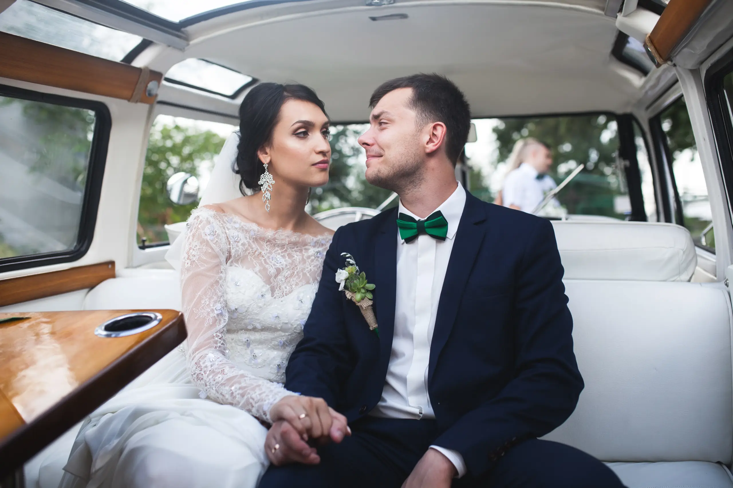 married-couple-posing-car